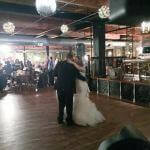 A bride and groom sharing a first dance