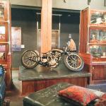 A motorcycle sitting on a table in a room