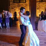 A bride and groom dance on the dance floor