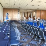 A banquet hall set up for a formal function