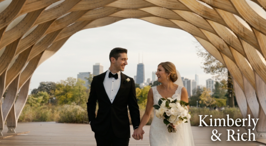The bride and groom are standing under a honeycomb in Chicago's Lincoln Park, a famous spot for wedding videography.