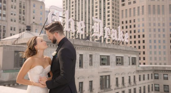 Bride & Groom at The Drake Chicago Rooftop with the Drake Sign