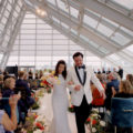 Couple walking down the isle after the ceremony at Adler Planetarium Wedding