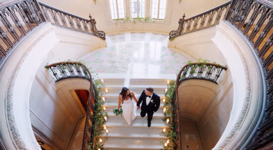 Couple on the stairs at The Armour House at Lake Forest