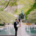 A couple on their wedding day in the South Garden at the Art Institute of Chicago.
