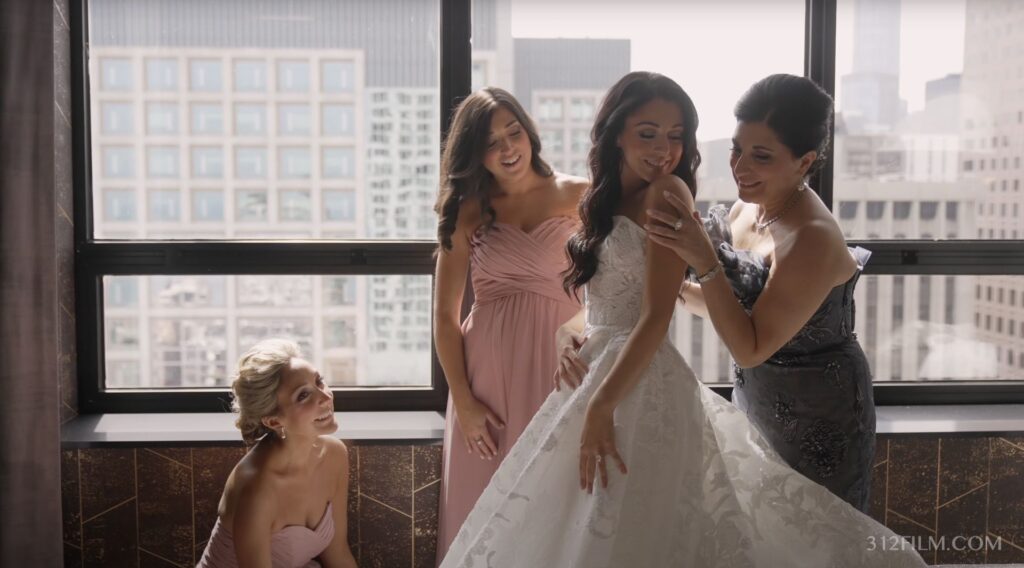 The bride is getting ready with her sisters and mother at the Ritz-Carlton in Chicago.