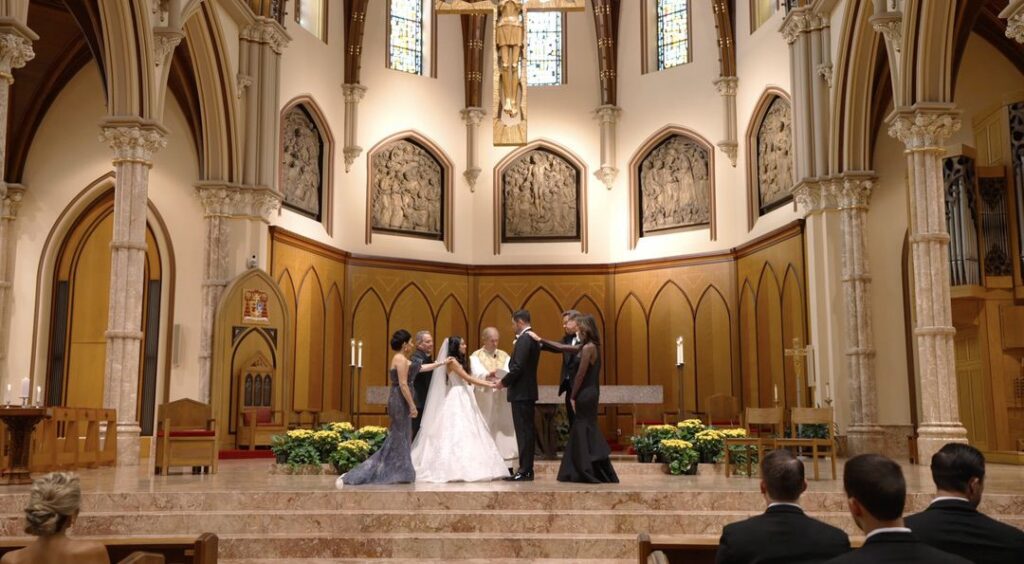Family make a blessing at Holy Name Cathedral Chicago