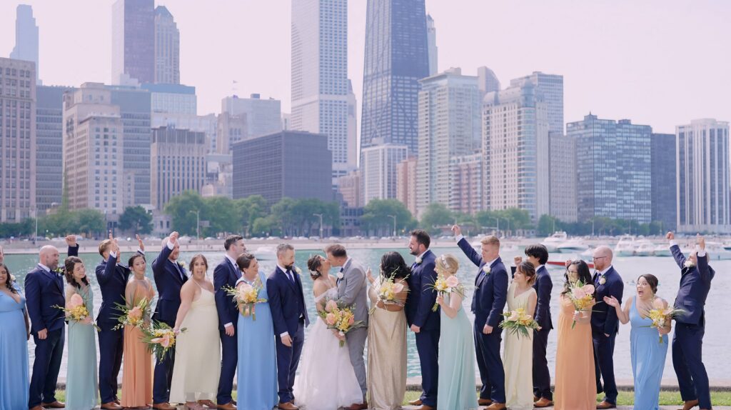 Christina & Jack and their wedding party with Chicago city skyline in the background