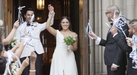 The bride and groom made a grand exit from the Fourth Presbyterian Church, cheered on by their guests.