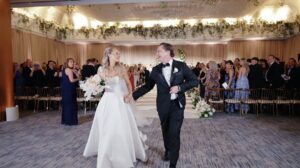 Bride and Groom Recession after their wedding ceremony at Ritz Carlton Chicago