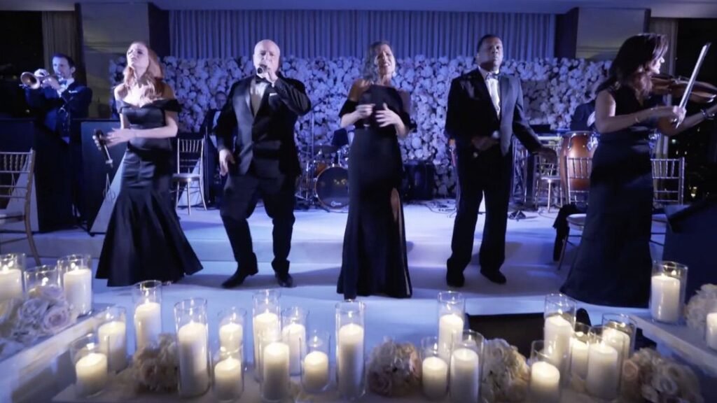 Ken Arlen is performing on stage at the Ritz-Carlton, Chicago.