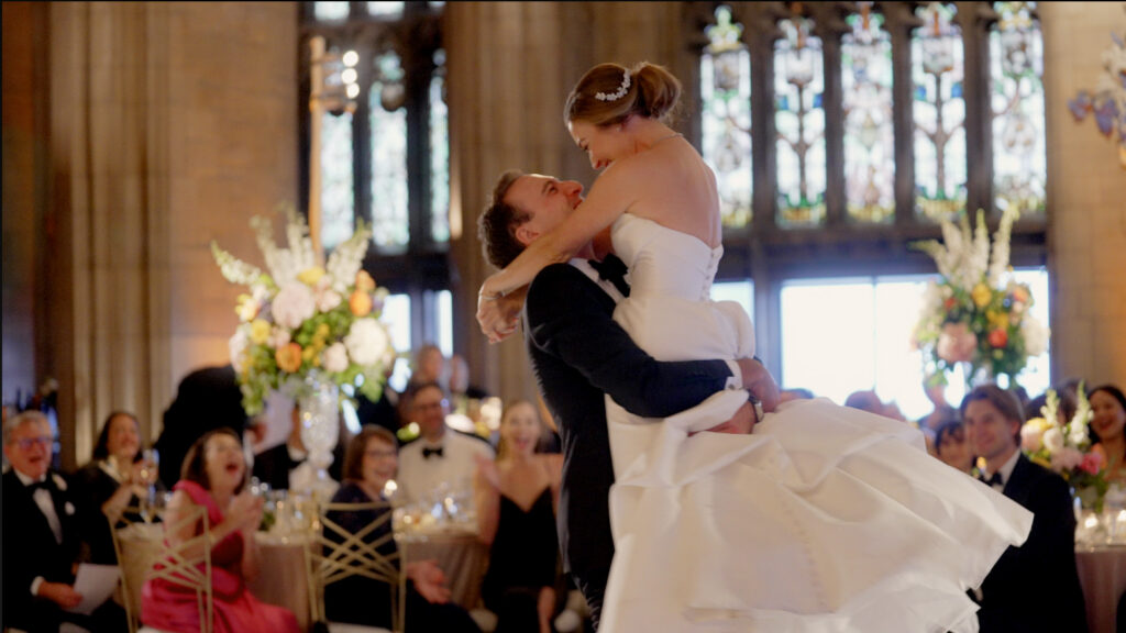 The bride and groom's first dance at the University Club of Chicago, with the bride's hair styled by Deco Amo.