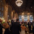 Kristen and Kyle are entering the wedding at the University Club of Chicago's Cathedral Hall.