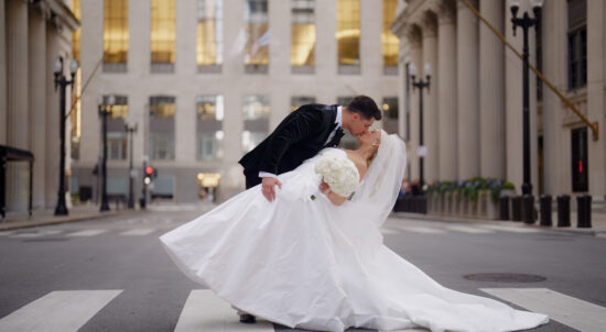 Mia and Stone on La Salle Street in Chicago on their wedding day.