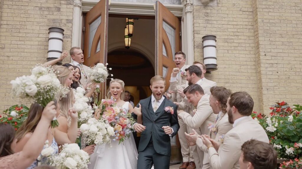 The bride and groom made a grand exit from Old St. Patrick’s Church, cheered on by their guests. 