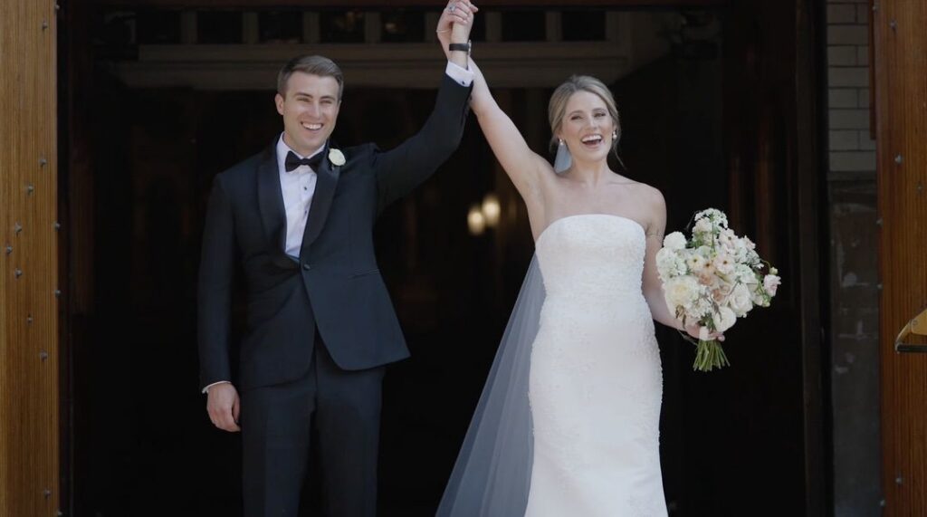 The bride and groom celebrated their wedding in front of Chicago's church, surrounded by flowers from Life in Bloom.