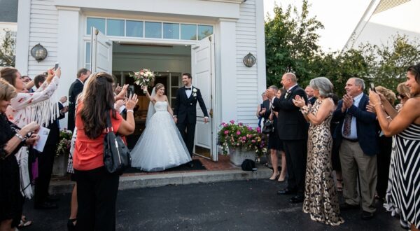 A couple leaving Christ Church Lake Forest after their wedding ceremony.