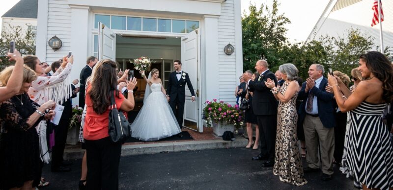 A couple leaving Christ Church Lake Forest after their wedding ceremony.